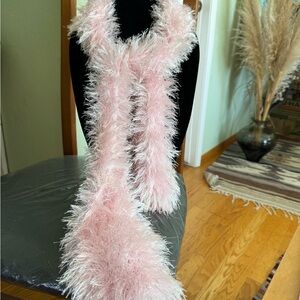 Beautiful pink fuzzy hand-knitted scarf